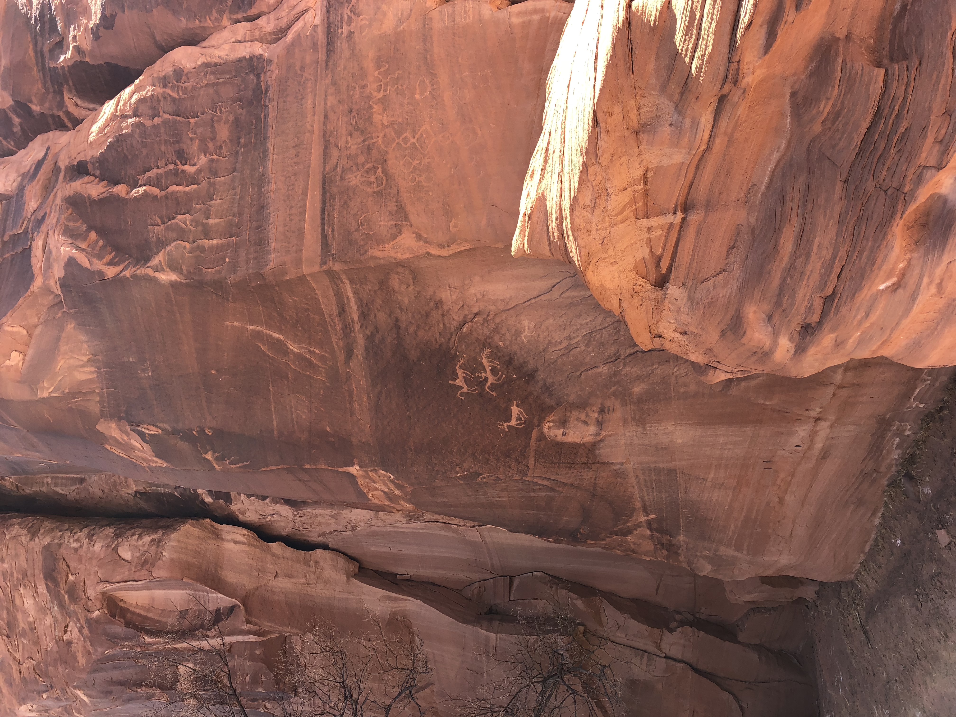 Petroglyphs on a sunlit rock in Canyon de Chelly